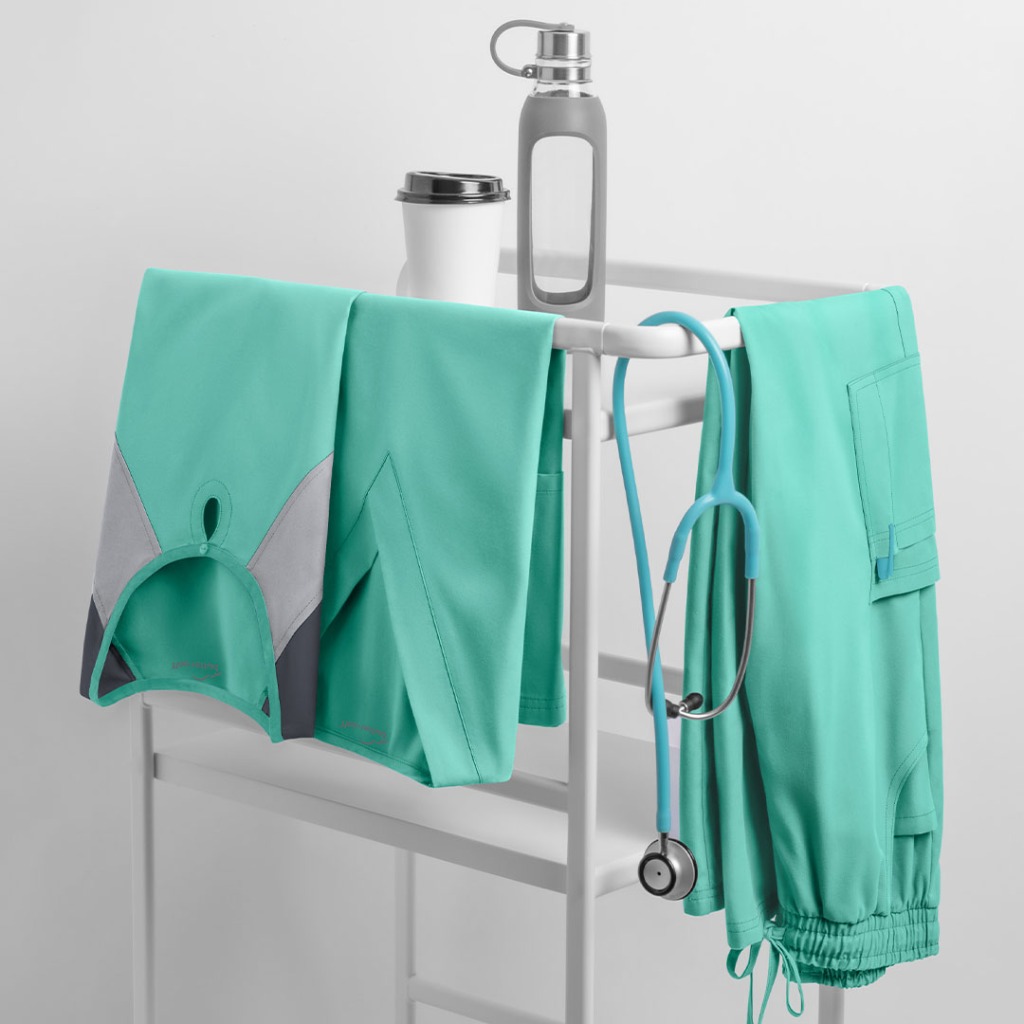 You can also keep a classic scrub look with the two pocket uniform top for women. Plus, the easy-care, wash and wear fabric from our Butter-Soft uniforms provides you with superior softness and comfort during your shift. The 2 patch pockets in front of the top is designed for your storage needs. The fabrication is also a comfortable brushed 65/25 poly/combed cotton blend. 