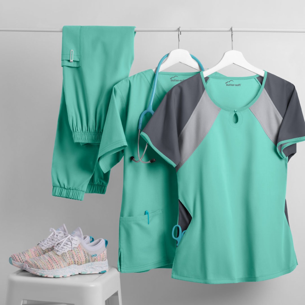 We're sure that our dazzling new color Green Aqua will brighten up your workday. Try it in our Butter-soft Block Top. It features a stylized keyhole neckline and flattering raglan sleeves. The multi-color top adds a pop of color to your scrub wardrobe. It's easy to take care of, super soft and made of brushed 65/35 poly/combed cotton blend. 
